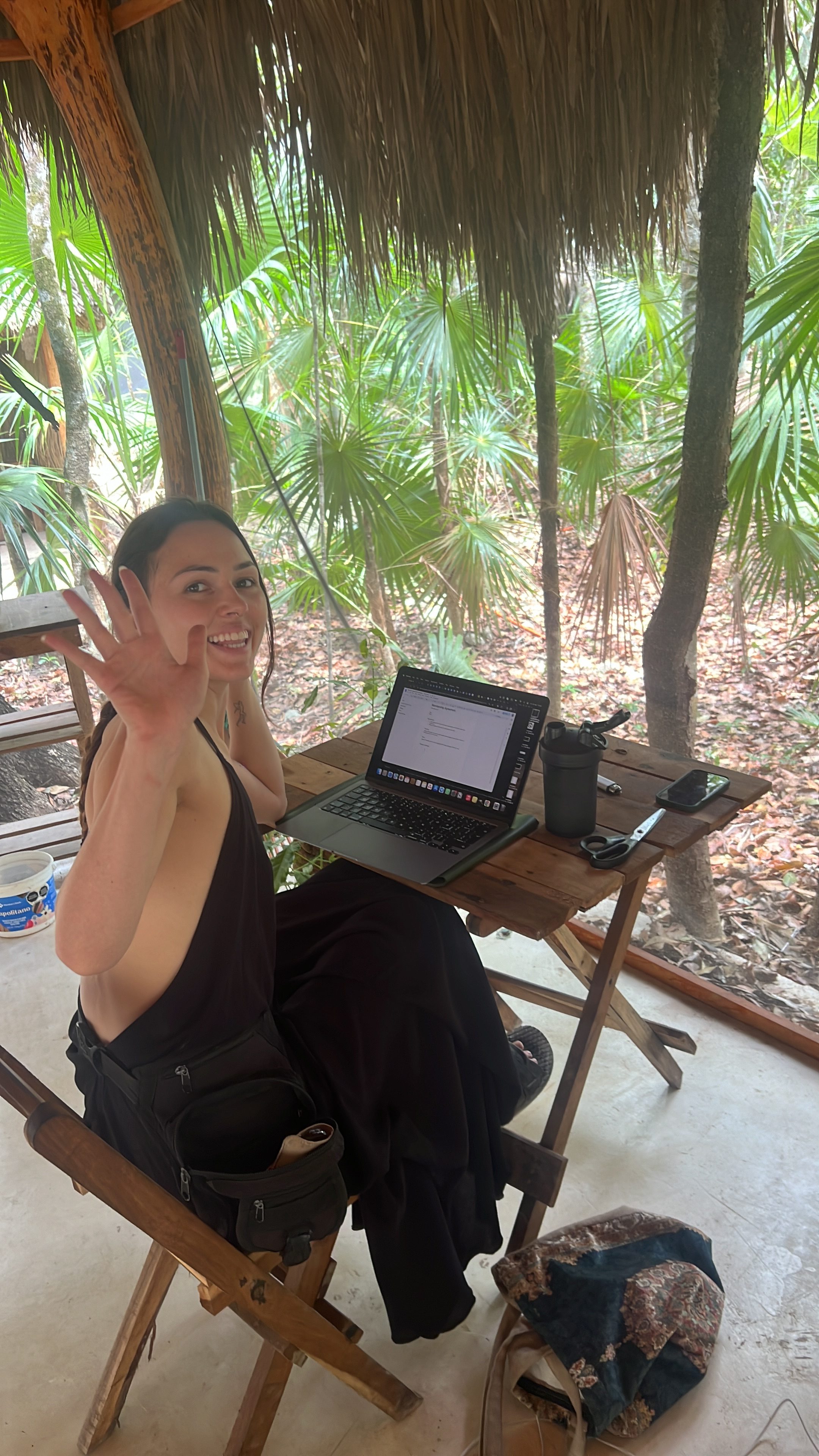 Working on a laptop in the jungle